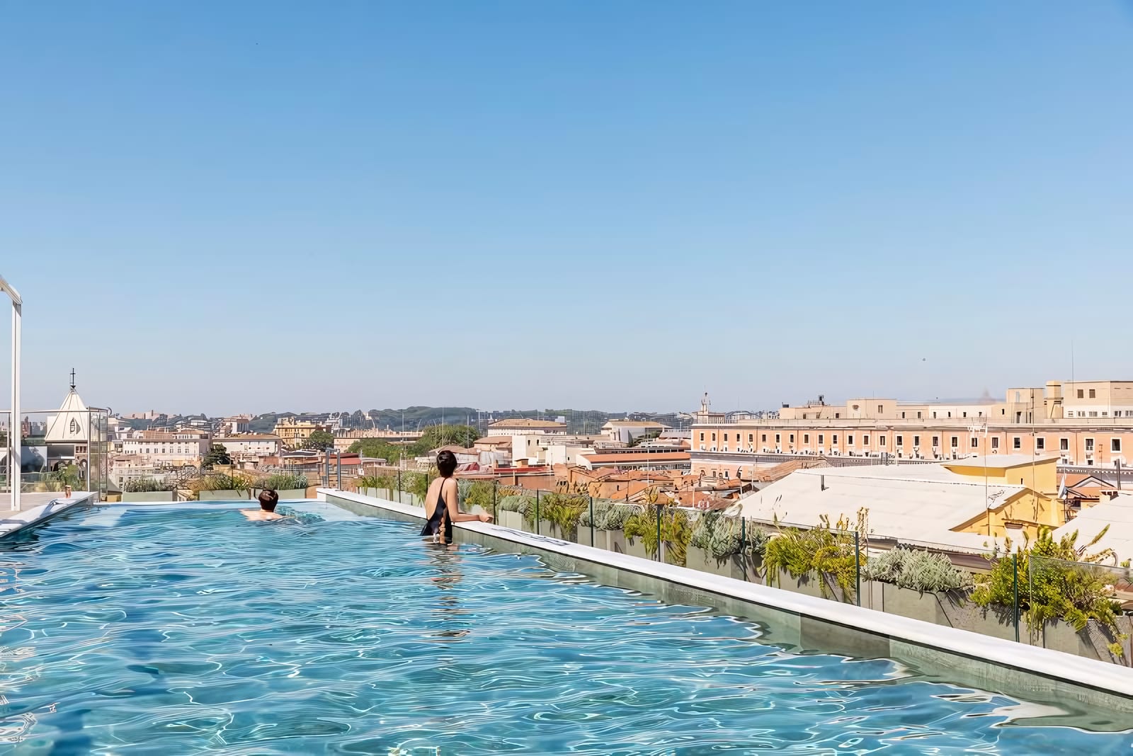 A rooftop pool beside SEEN by Olivier