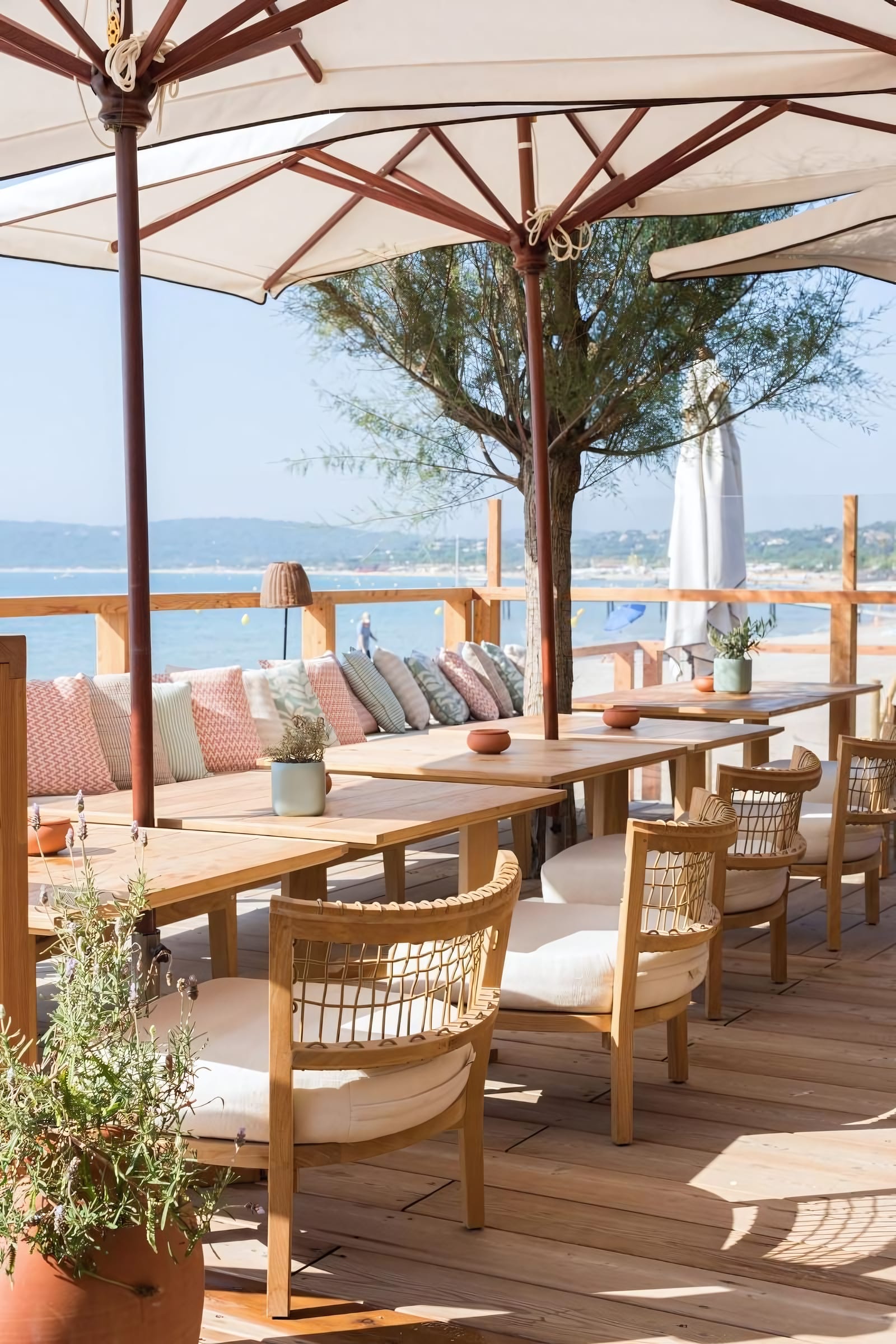 One table with a view, one table in the sand