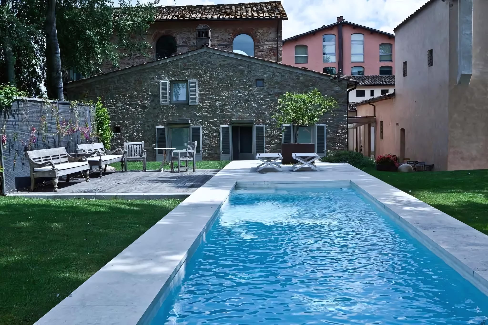 The stone lounge and white sandstone pool
