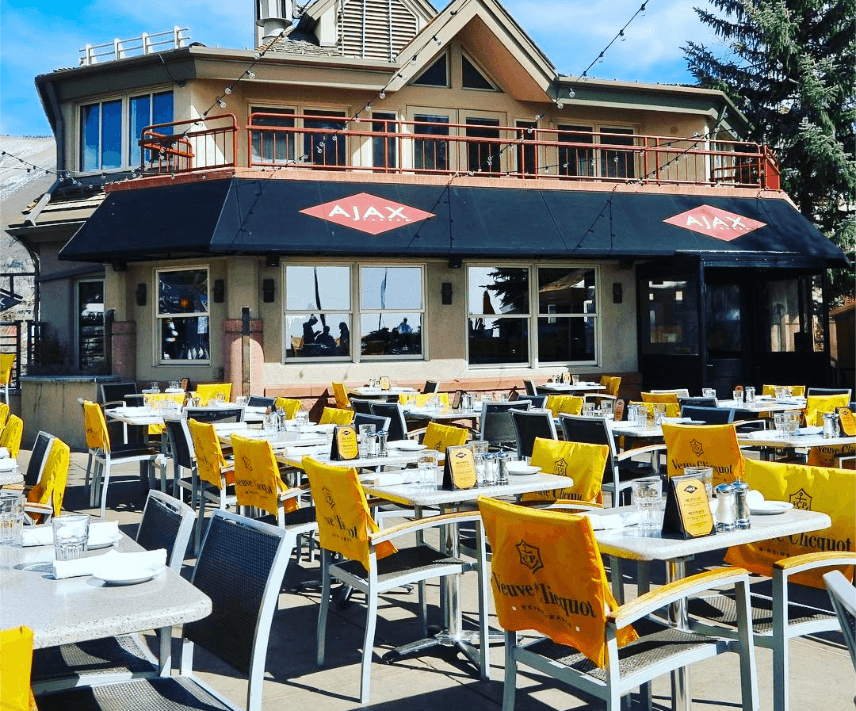 Grab a table at Ajax Tavern's patio