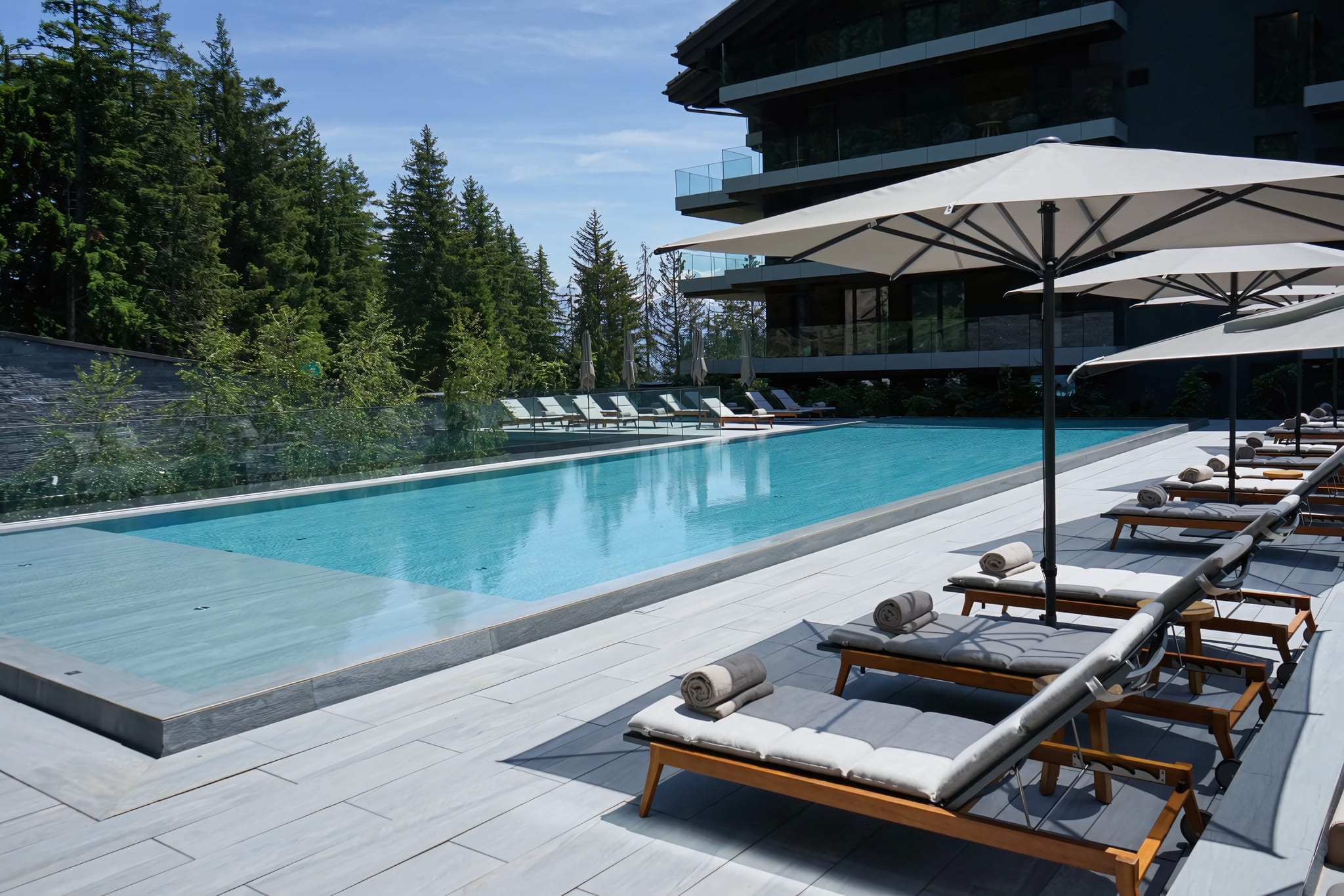 Alpine Pool with Mountain Village Setting