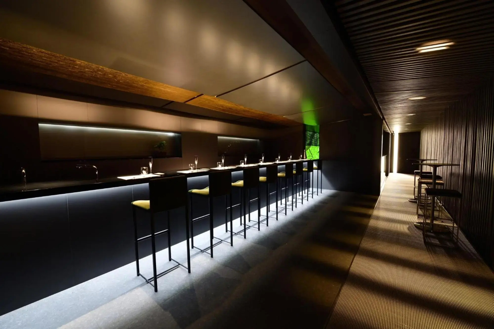 A Second-Floor Bar Built Around an 8-Metre Counter